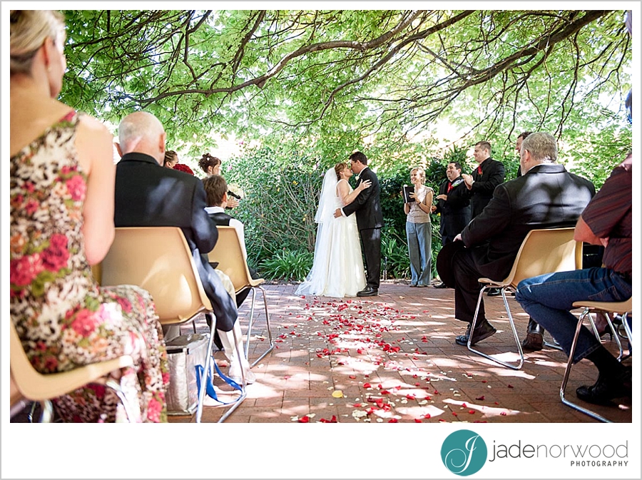 bride and groom kissing partridge house weddings photos