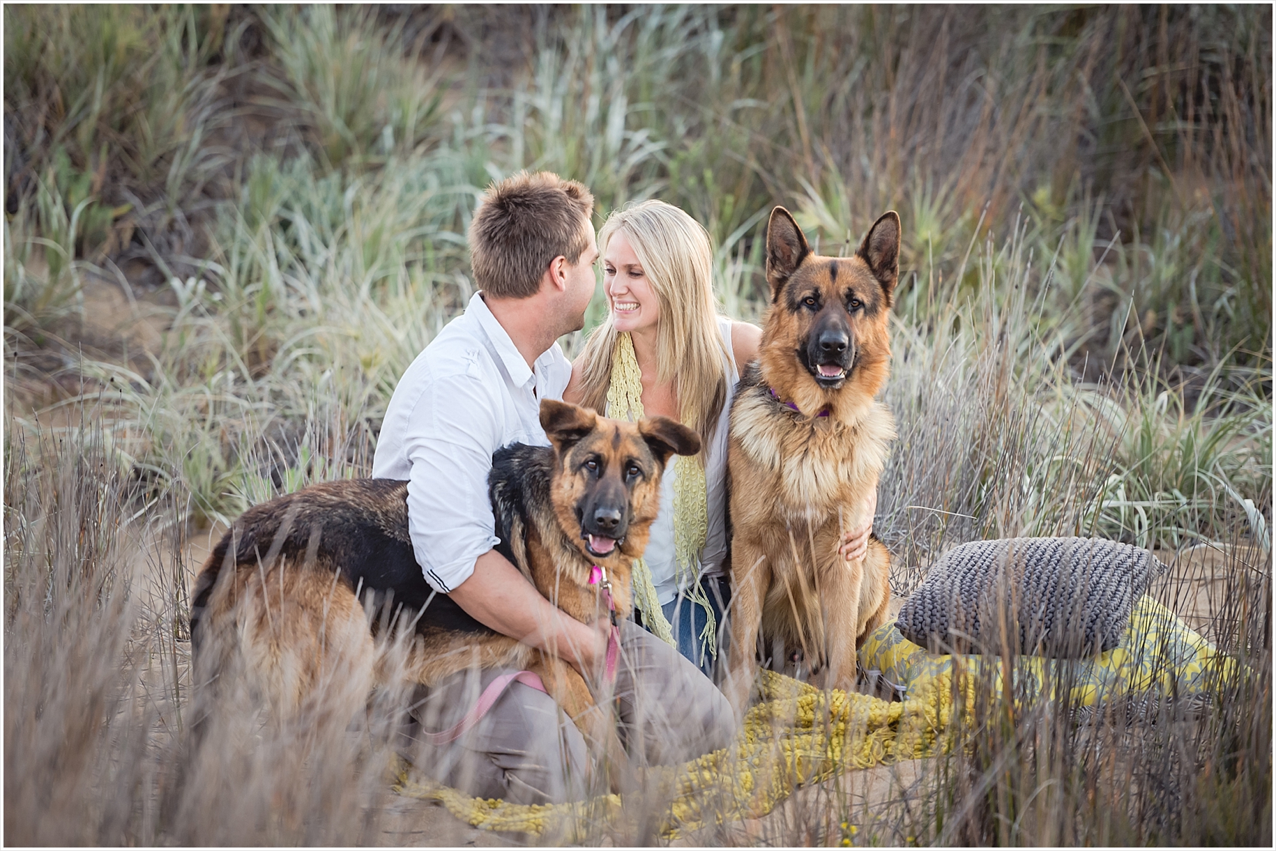 beach love fun engagement pictures with dogs