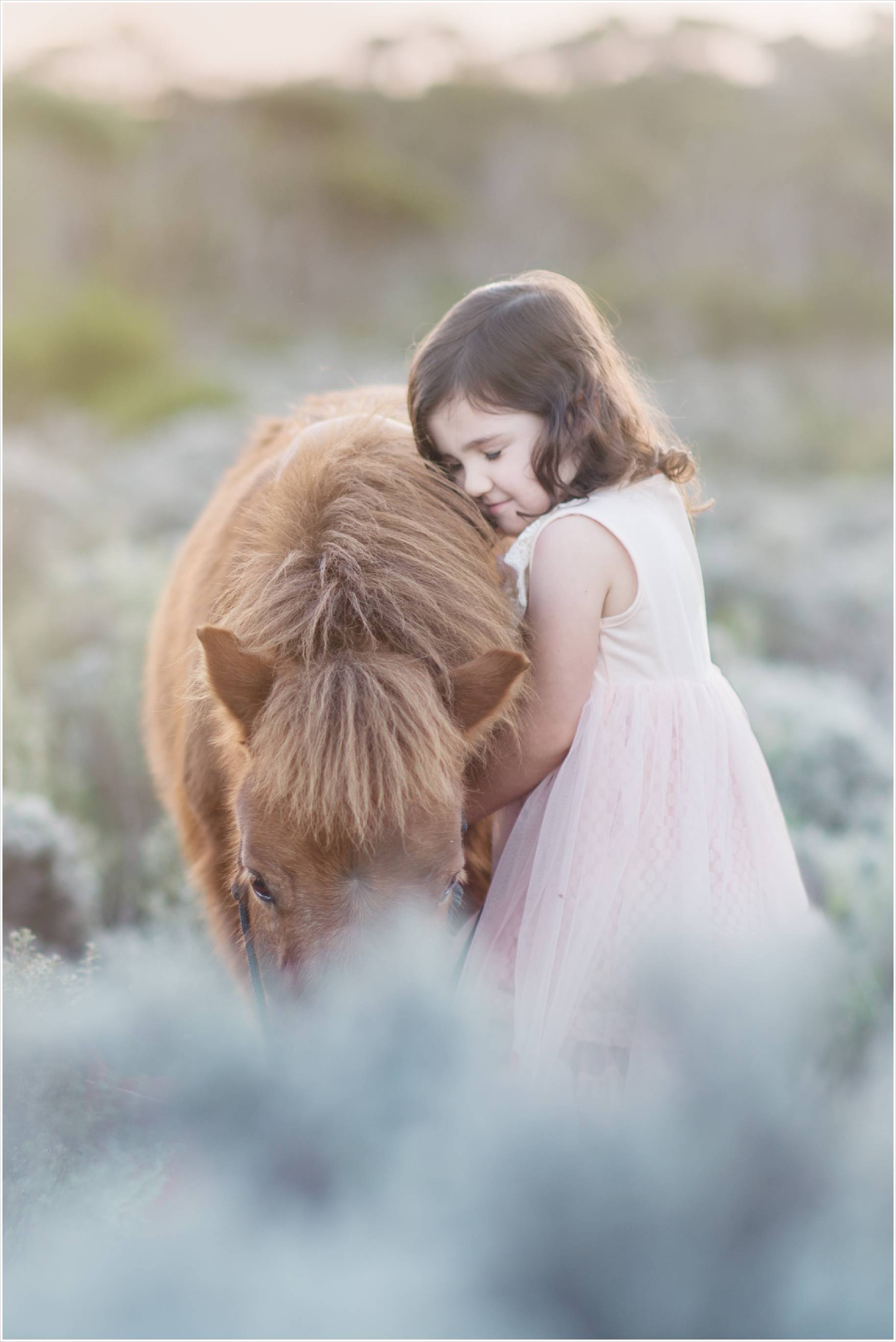 young girl and pony